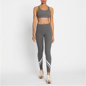 Tory Burch High-rise Compression Melange side-pocket chevron legging